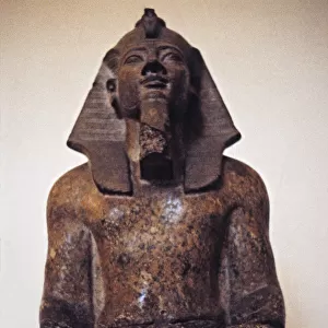 Statue of Pharaoh Amenophis II or Amenhotep, of the XVIII dynasty, making an offering