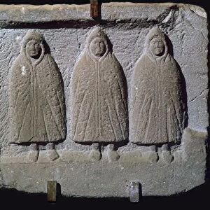 Stone relief of a trio of hooded Romano-British deities, 3rd century