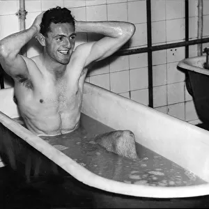 Eddie McMorran, Manchester City footballer taking a bath after training