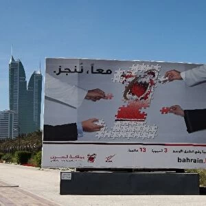Formula One World Championship: Advertising banner on the road to the circuit from Manama
