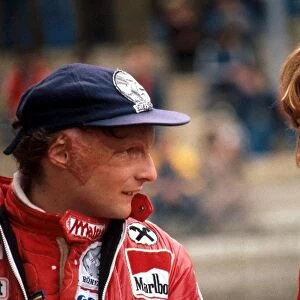 Formula One World Championship: Despite being bitter├ò rivals second place finisher Niki Lauda Ferrari talks with seventh place finisher
