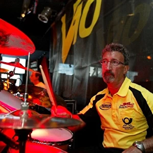 Formula One World Championship: Eddie Jordan plays the drums with his band, the V10 s