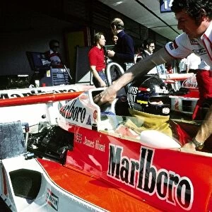 Formula One World Championship: Gary Anderson McLaren Chief Mechanic pushes back the McLaren M26 raced for the first time in 1977 by James Hunt