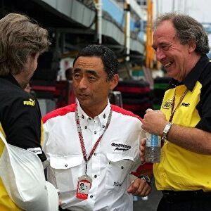 Formula One World Championship: James Robinson Jordan Head of Race and Test Engineering talks with Hiroshi Yasukawa Bridgestone Director of Motorsport