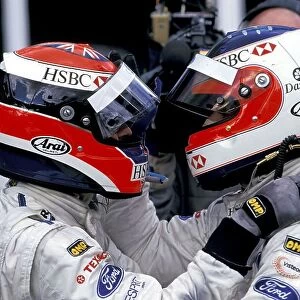 Formula One World Championship: Rubens Barrichello celebrates with Johnny Herbert in Parc Ferme