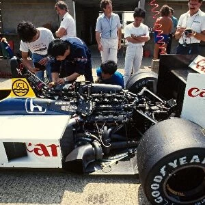 Formula One World Championship: The Williams Honda mechanics work on Nelson Piquets car