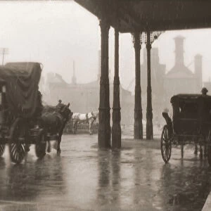 Lantern slide of the American Interchange. Photograph of horse and coach arriving at the depot entrance in Montreal; Montreal, Quebec, Canada