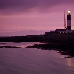 Mew Island, Belfast Lough, County Antrim, Ireland; Lighthouse Beacon At Night