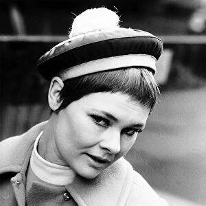 Actress Judi Dench modelling Christian Dior hat from the spring collection called
