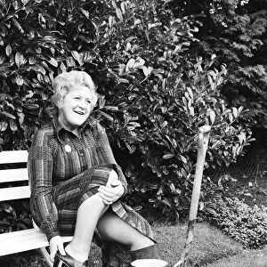 Actress Molly Sugden at home in her garden. 12th November 1977