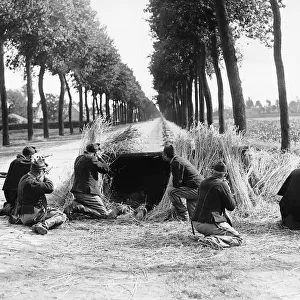 Belgian troops defending a road leading to Fort Waelham Antwerp from German attack