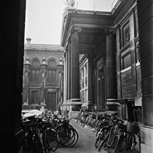 Bicycles parked outside one of the University colleges in Oxford. Circa 1950