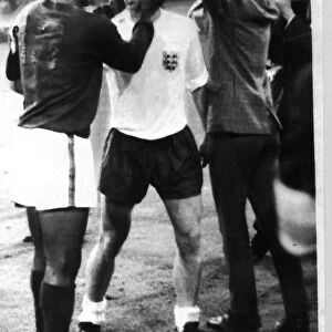 Bobby Charlton of England and Eusebio Portugal after the World Cup Semi Final in 1966