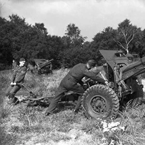 The British Army in training with a new 25lb field gun. World War Two