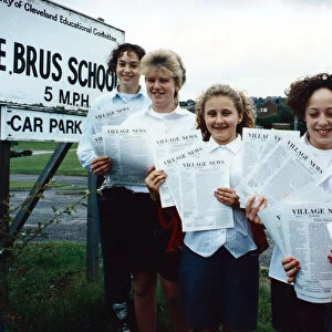 De Brus School pupils with their community newsletter - left to right, Louise Calvert