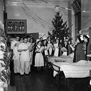 Carols in the wards at Salford Royal Hospital. Christmas Eve