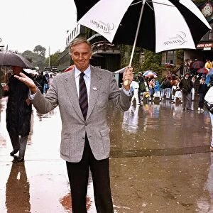 Charlton Heston American Actor at Wimbledon Holding umbrella