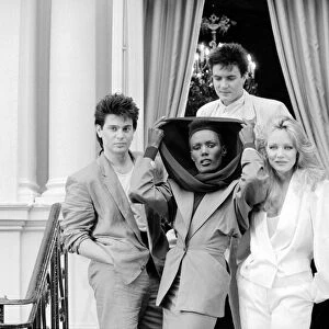 Duran Duran with Grace Jones and Tanya Roberts at a press call the day after the film