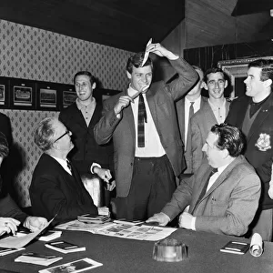 Everton players hand in their passports to chairman John Moores ahead of their trip to