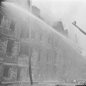 Firemen tackling a blaze, Circa 1940
