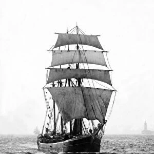 The four-masted barquentine sailing ship Helga in full sail leaving the River Tyne bound