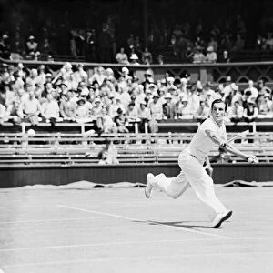 Fred Perry playing a backhand shot at The Wimbledon Mens Tennis Championships 1935