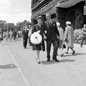 Fred Perry with his wife Barbara Riese at Wimbledon Tennis Championships