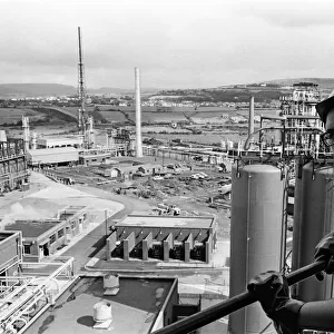Llandarcy oil refinery. Trainee engineer John Bolt, 21, gets a birds eye view of the oil