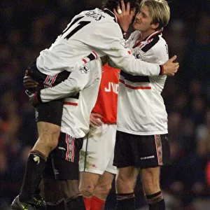 Manchester United winger David Beckham kisses team mate Ryan Giggs after scored in