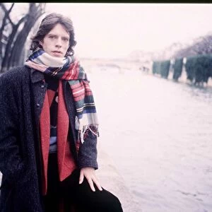 Mick Jagger Singer in Paris wearing a tartan scarf 1985