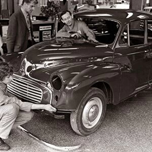 Morris Minor 1974 - Motor Car men working on car