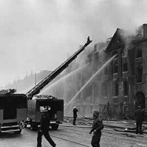 National Fire Service attend the scene of destruction after flying bomb crashed