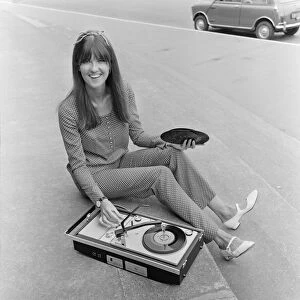 Picture shows The Ready Steady Go TV pop show presenter Cathy McGowan holding a