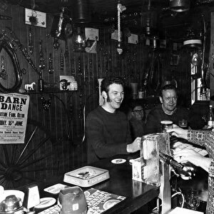 Publican of the year Mrs Jean Cook pulling a pint. 6th May 1973