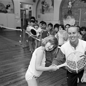 Pupils from Birkby Infant School, learn short tennis from Karen McLoughlin