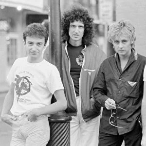 Queen Left to Right John Deacon, Brian May, Roger Taylor