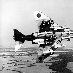 A RAF McDonnell Douglas F-4 Phantom II carrying seven BL755 cluster bombs