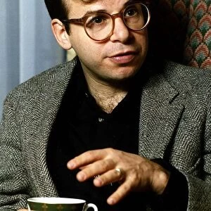 Rick Moranis Actor - holding a cup of tea A©Mirrorpix