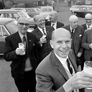 Secretary of the Bald Head d Mens Club Vic Hinds with some of his members outside