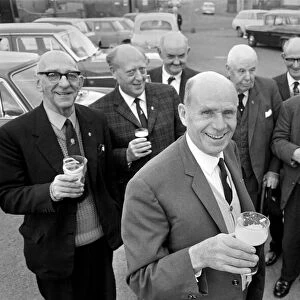Secretary of the Bald Head d Mens Club Vic Hinds with some of his members outside