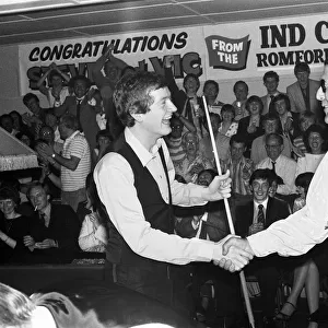 Snooker player Steve Davis with Mike Reid in Romford shaking hands after a game of