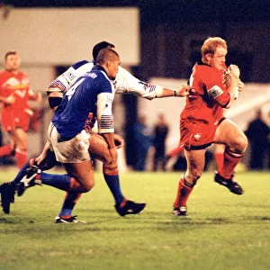 Sport - Rugby League - Wales v Western Samoa - Martin Hall makes a break for Wales at