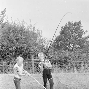 Youngsters Danny Woodhouse and Ian Mannering seen here fishing