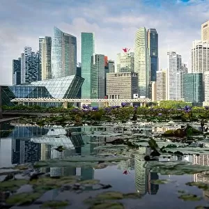 Low angle view of Singapore business district skyline and office skyscraper at day in Marina bay, Asian tourism, modern city life, or business finance