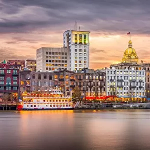 Savannah, Georgia, USA skyline on the river at dusk