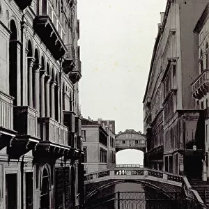 The bridges over rio di Palazzo, in Venice. On the left, Palazzo Trevisan later Cappello. In the foreground a bridge with an iron railing