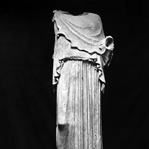 Headless statue of Minerva dating to the Archaic period, preserved in the National Museum of Rome, Rome