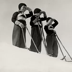 Three little fascists balilla dressed for skiing