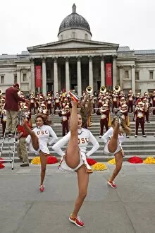 USC Marching Trojans band and cheerleaders performing in Trafalgar Square, London, England