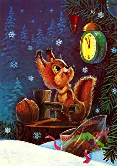 Under the Christmas tree squirrel looks at his watch and preparing to break a walnut with Under the Christmas tree squirrel looks at his watch and preparing to break a walnut with